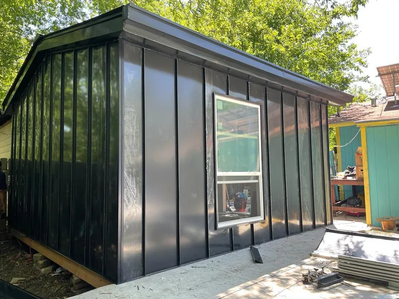 Black standing seam metal wall panels for Roof Inspection in Flower Mound