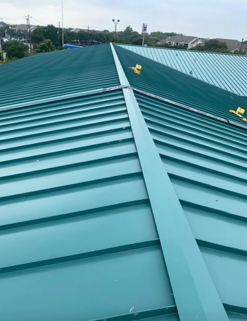 Green commercial metal roof ridge and valley for Metal Roof Repair in Flower Mound