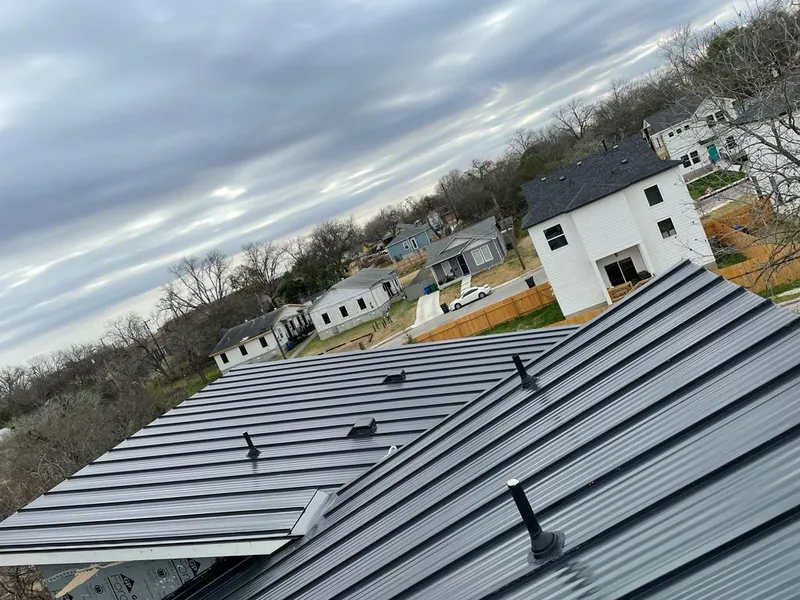 Standing seam metal roof panels with vents for Skylight Repair in Flower Mound